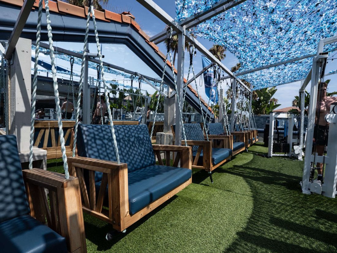 Outdoor lounge swings on the rooftop deck